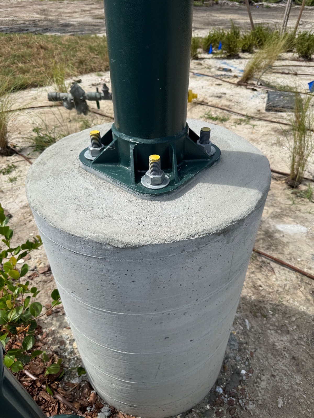28 Light Pole Bases, Smoothed and Grouted | North Port